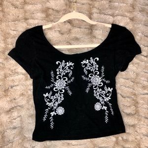 Black crop top with white embroidery in size small